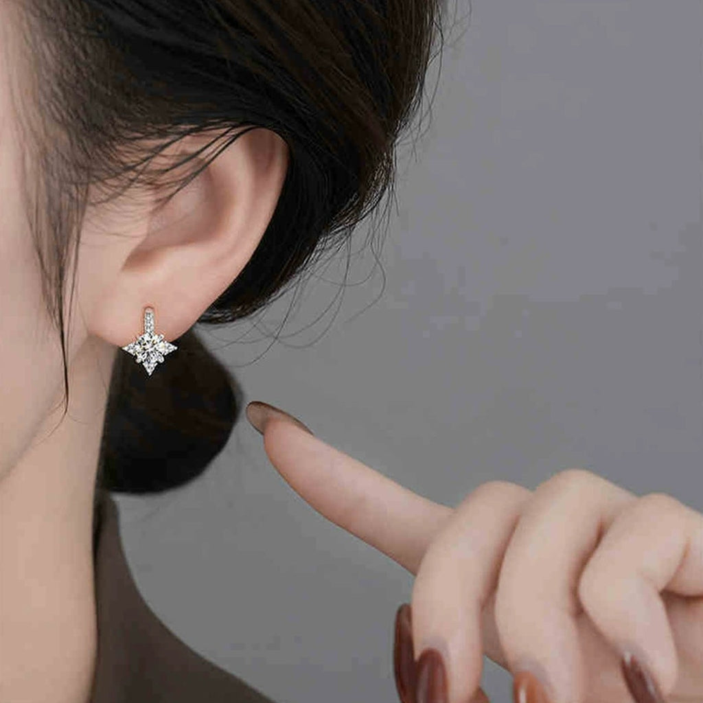 Star Halo Round Moissanite Hook Drop Earrings with CZ in White Gold-Plated S925 sterling silver worn on ear by model showing scale, placement, and hook drop earrings styling