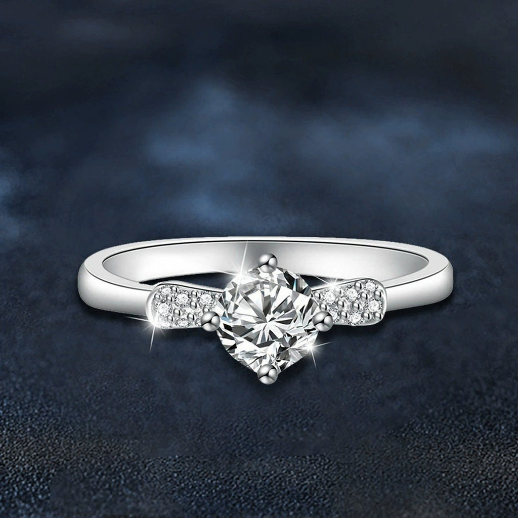 Crown Halo Round Moissanite Engagement Ring with CZ close-up detail view with moissanite sparkle
