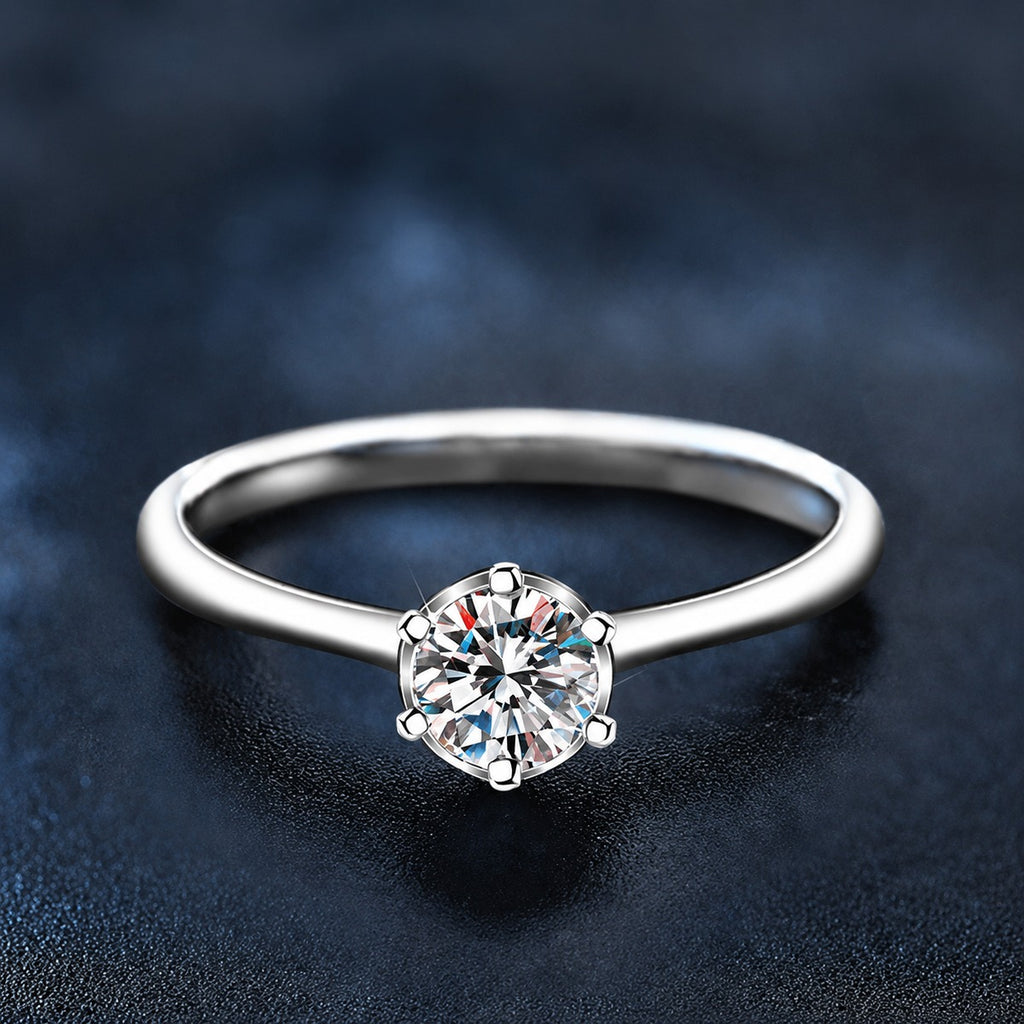 Classic Six-Prong Round Moissanite Solitaire Engagement Ring close-up detail view with moissanite sparkle