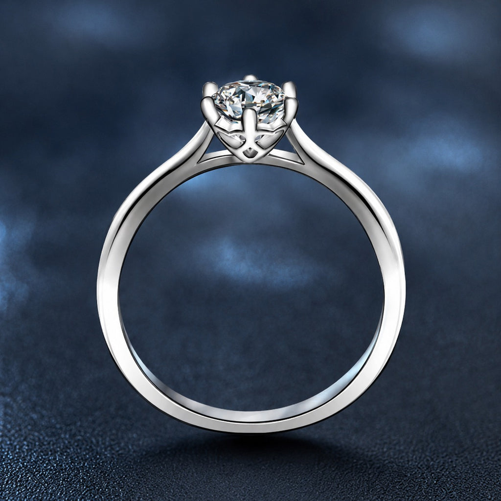 Classic Six-Prong Round Moissanite Solitaire Engagement Ring close-up detail view with moissanite sparkle