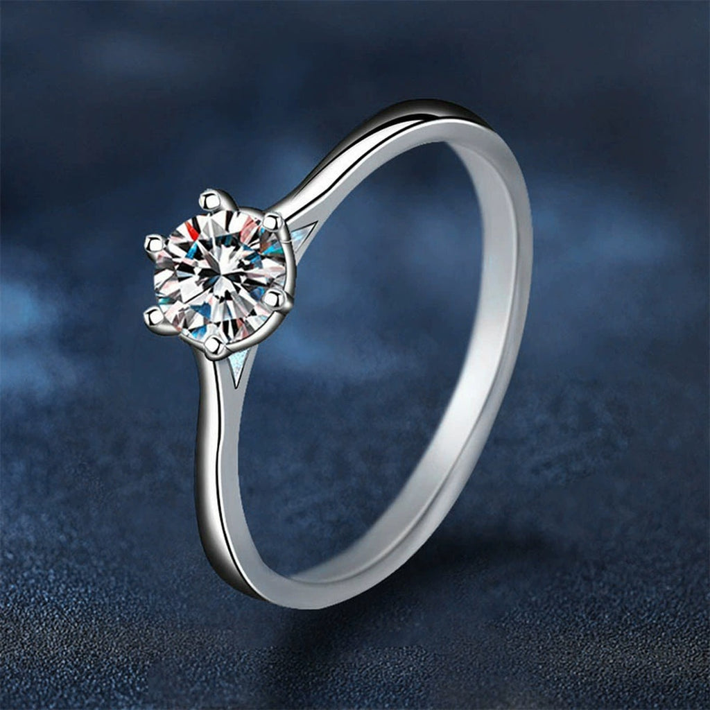 Classic Six-Prong Round Moissanite Solitaire Engagement Ring close-up detail view with moissanite sparkle